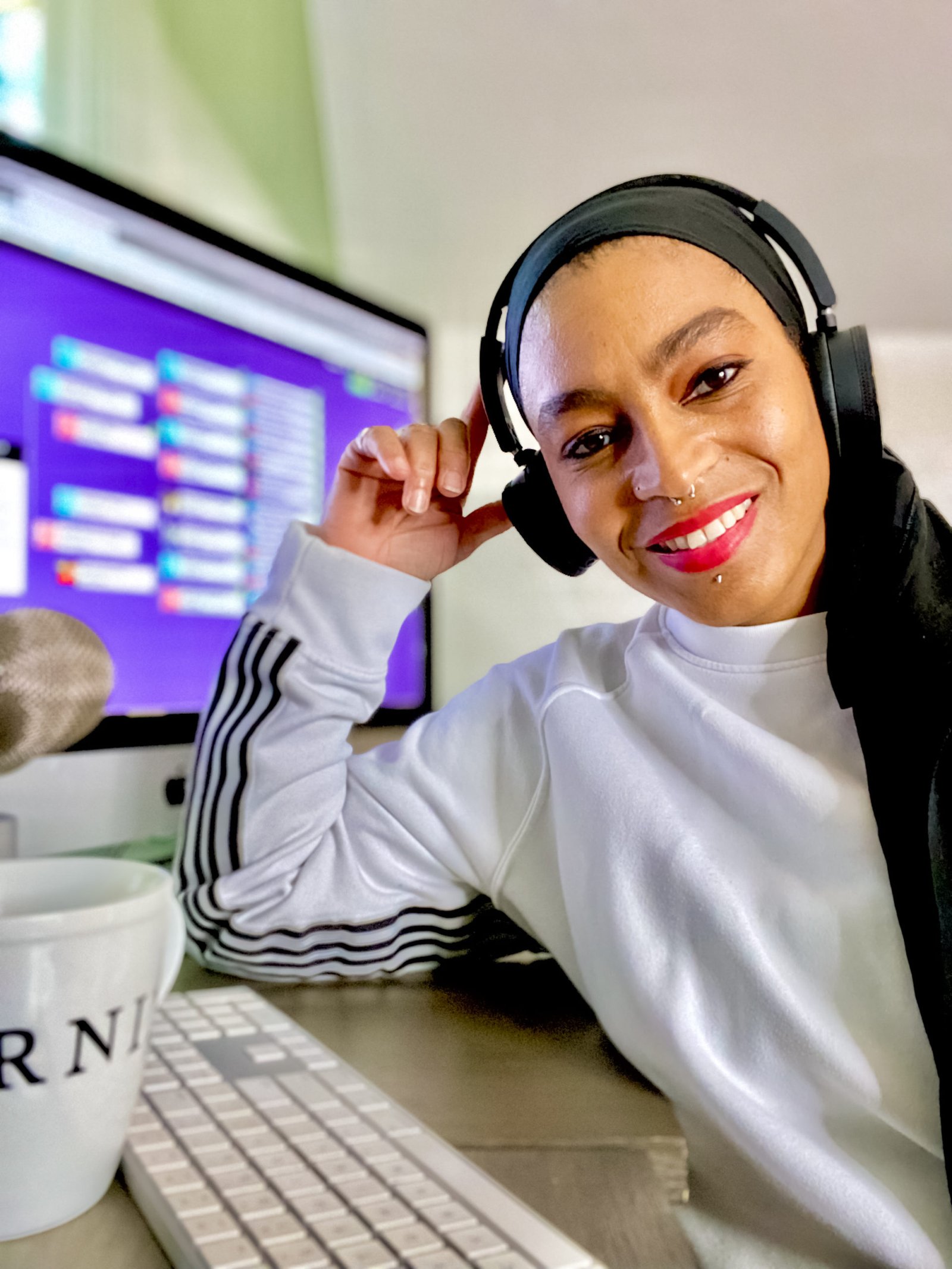 Aisha Abdul Rahman at her desk, researching a family tree