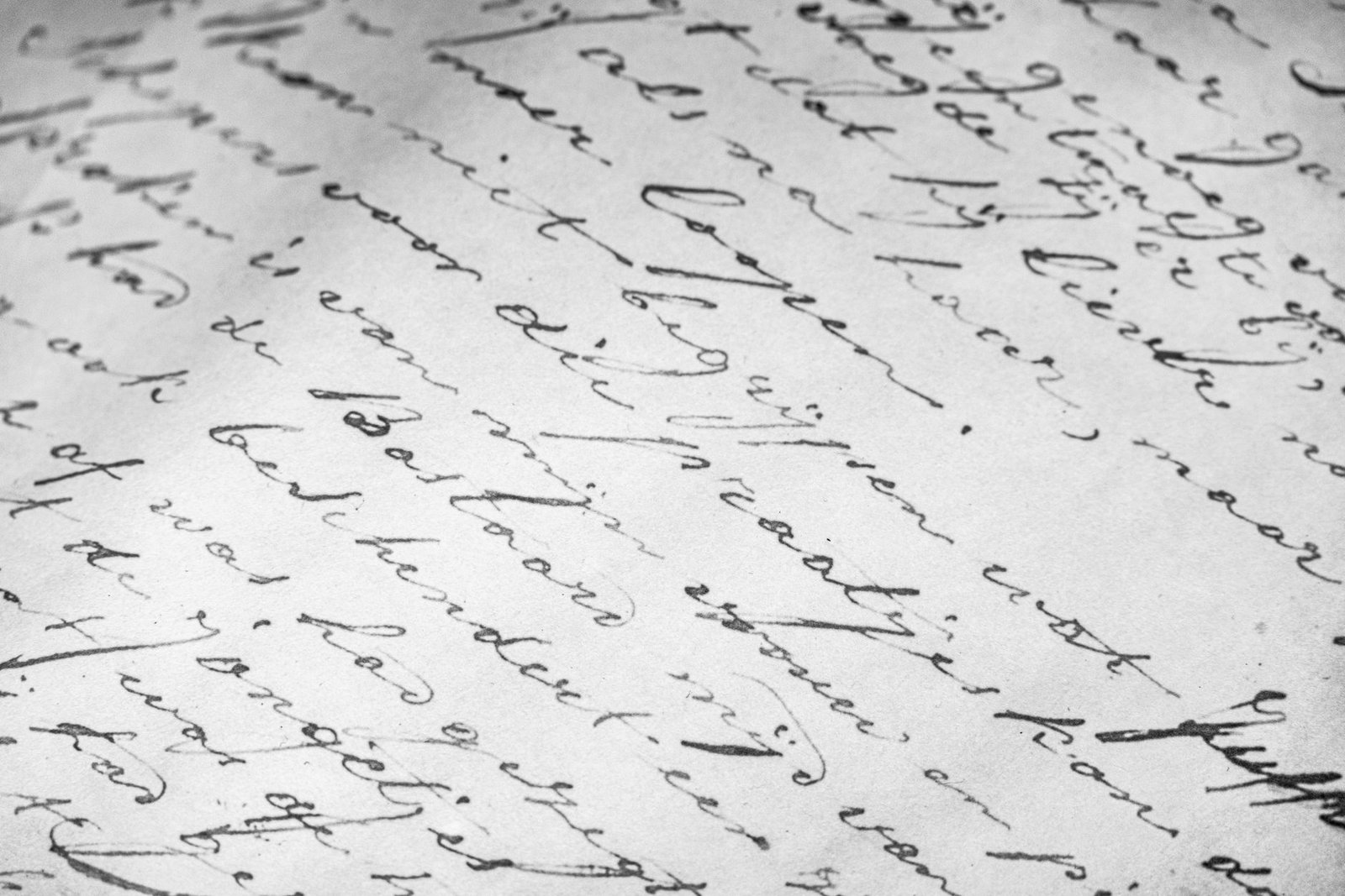 Close-up of vintage cursive handwriting on old paper
